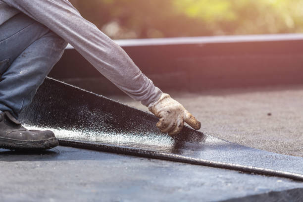 Professional Basement Waterproofing technician working in Saint Joseph, TN